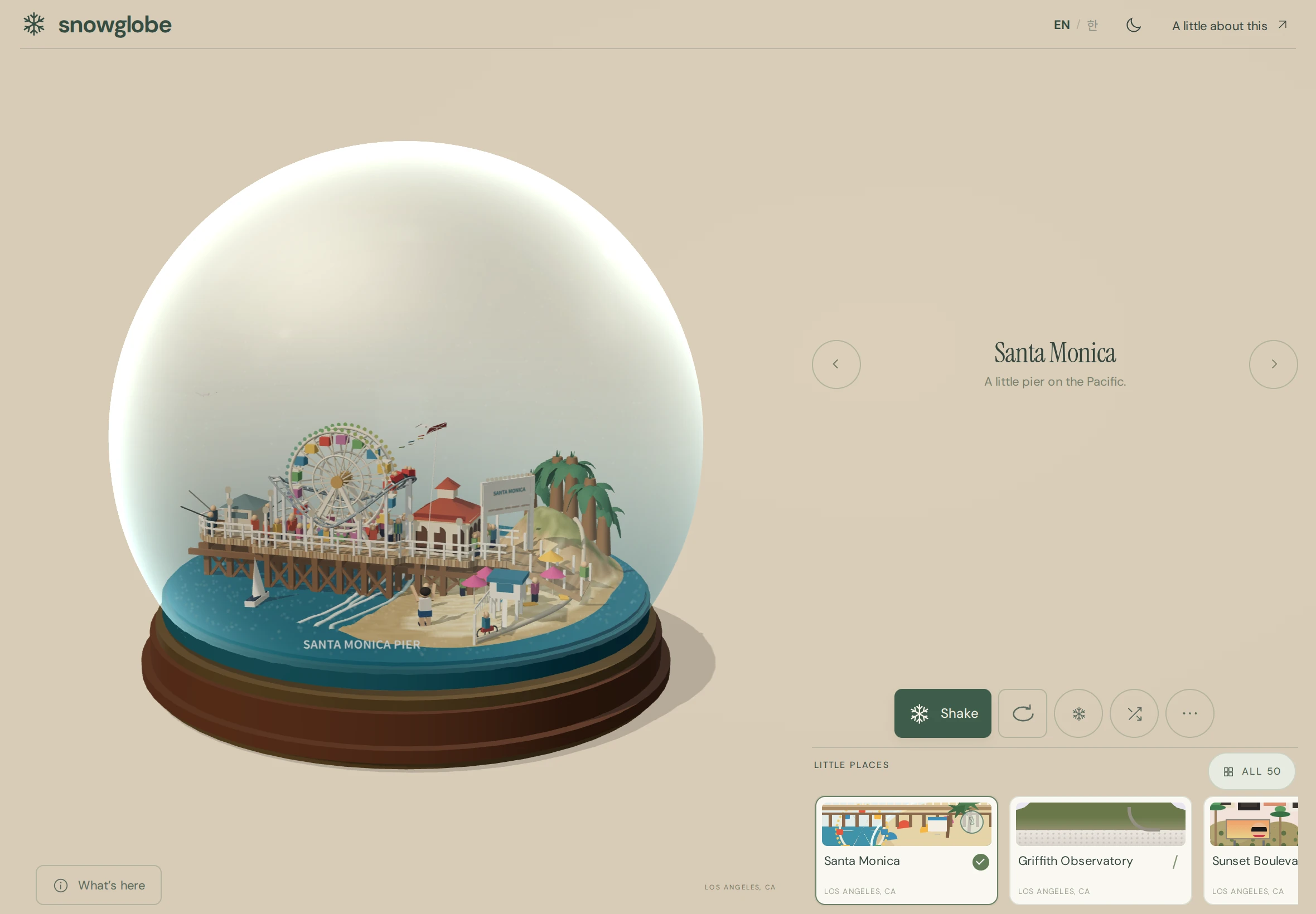 Santa Monica Pier inside a snowglobe, in light mode on an iPad in landscape